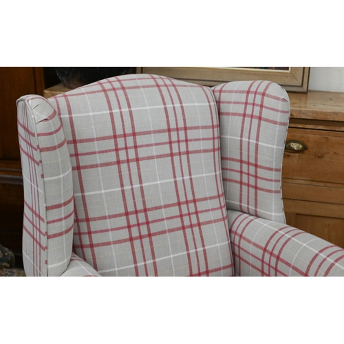 140 - A Georgian style wingback armchair with checked fabric and cabriole front legs