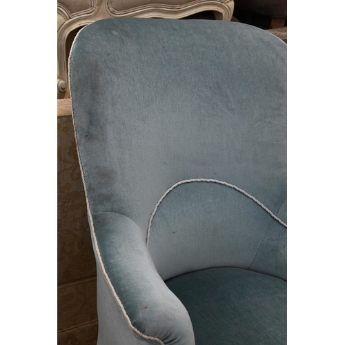 145 - # Antique spoon back armchair, blue dralon fabric on carved front legs (evidence of old worm to back... 