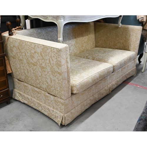 150 - A Knole two-seater sofa with old gold floral upholstery and turned hardwood finials, 192 x 90 x 100 ... 