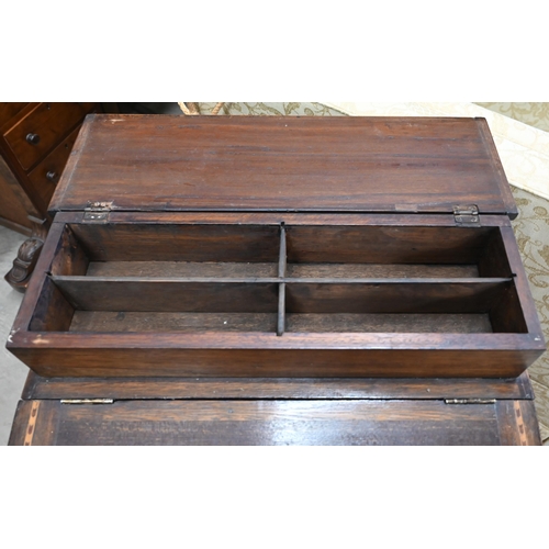 152 - An Edwardian mahogany inlaid Davenport with hinged top inset with tooled leather with four side draw... 