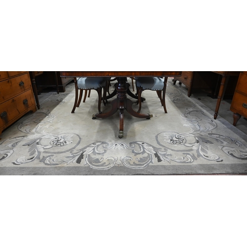 160 - An Indian (Namrata Exports) tufted wool grey ground carpet with scrolling foliate 'Mary Lou' borders... 