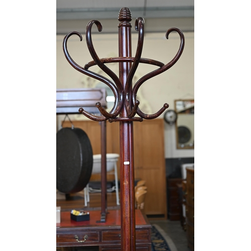 161 - A Thonet-style bentwood hall stand with hat and coat hooks, stick stand and loose metal drip tray, 2... 