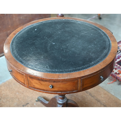 163 - A reproduction mahogany drum table with tooled leather top and tripod base, 58 cm diam x 72 cm high