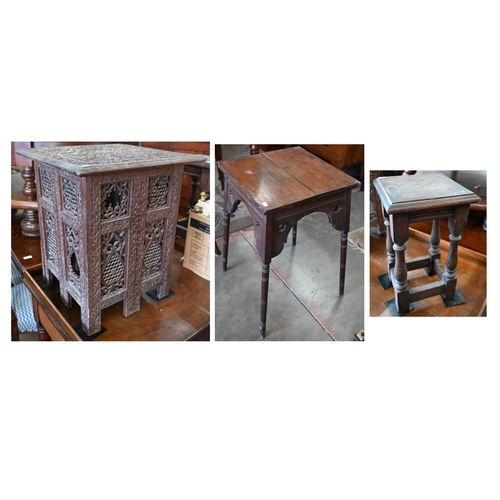 167 - A late 19th century Anglo-Indian carved hardwood table on pierced folding base, 45 x 45 x 50 cm high... 