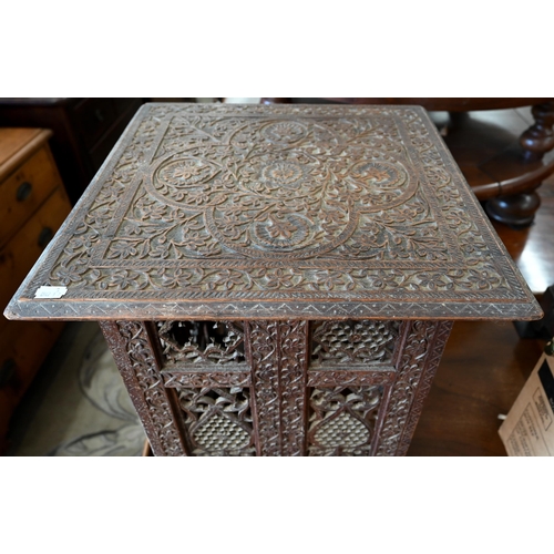 167 - A late 19th century Anglo-Indian carved hardwood table on pierced folding base, 45 x 45 x 50 cm high... 