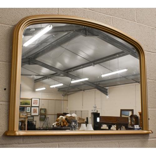 174 - A modern arched over mantel in moulded gilt frame, 106 x 75 cm