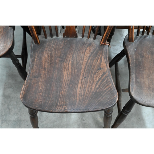 185 - A set of six ash and elm wheelback dining chairs (2 carvers and 4 standard)