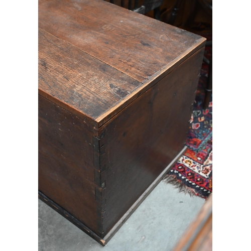 195 - An antique hardwood trunk, carved inscription to underside of hinged top 'Charles Forbes esq, Devons... 