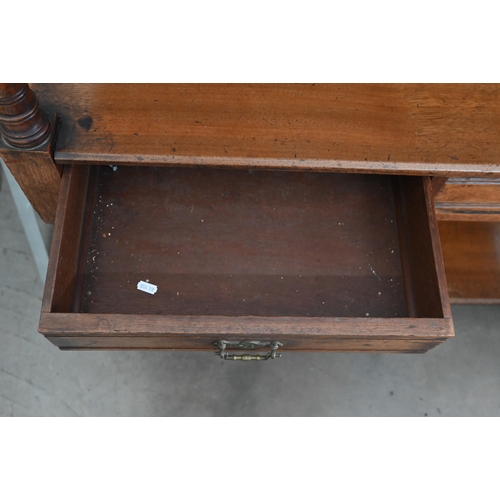 198 - An Edwardian mahogany three-tier buffet with two drawers and turned supports on casters, 104 x 46 x ... 