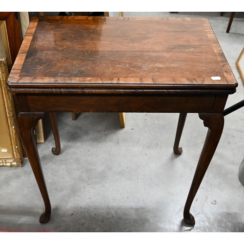 201 - A mahogany and walnut crossbanded card table with baise lined rotating folding top with Howard &... 