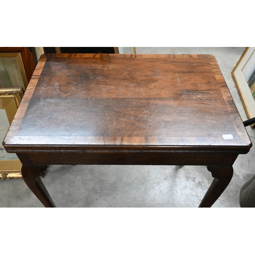 201 - A mahogany and walnut crossbanded card table with baise lined rotating folding top with Howard &... 