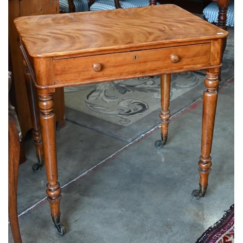 202 - A late Victorian satin birch writing table with hinged panel enclosing stationery compartments and s... 