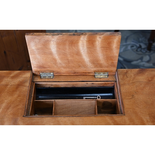 202 - A late Victorian satin birch writing table with hinged panel enclosing stationery compartments and s... 