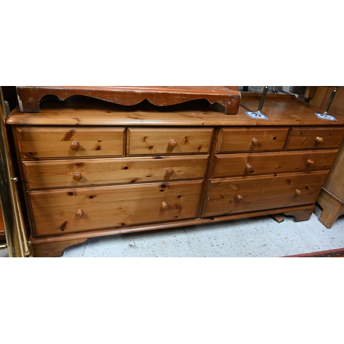 214 - A modern pine (possibly Ducal) sideboard with eight drawers, 166 x 46 x 74 cm