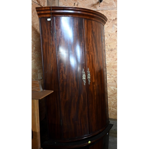 217 - A 19th century mahogany barrel front hanging corner cupboard 102 cm high