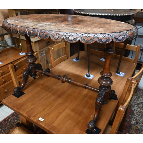 223 - A Victorian walnut foliate carved oval table, a/f, 102 x 64 x 70 cm high