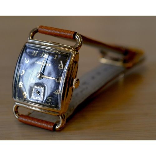 265 - A manual vintage gents Longines gold plated wristwatch, the brown enamel square dial with gilt hands... 