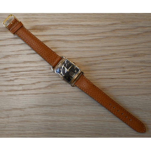 265 - A manual vintage gents Longines gold plated wristwatch, the brown enamel square dial with gilt hands... 