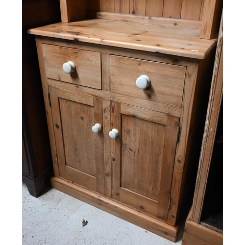 29 - A stripped pine small cottage dresser to/with a pine open wall spice rack (2)