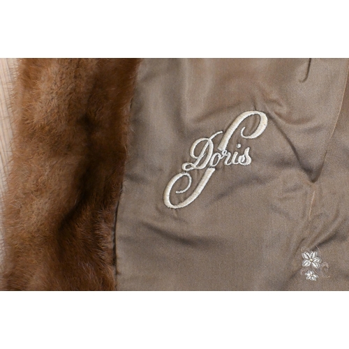 299 - A brown mink jacket with belt and matching stole