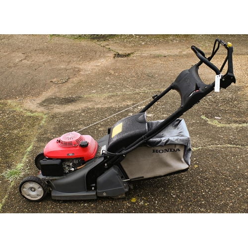 3 - A Honda HRX 426 4-stroke petrol lawn mower c/with grass collecting box, running well