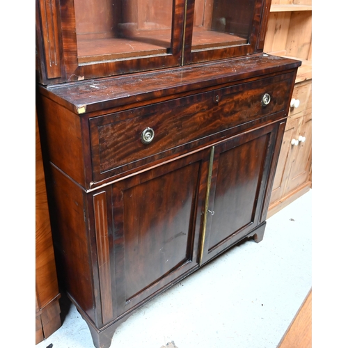 30 - A Victorian mahogany secretaire bookcase, the pair of glazed-in doors over a fitted secretaire drawe... 