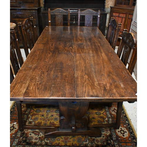 38 - A heavy quality 17th century style oak refectory dining table to/with a set of six moulded and carve... 