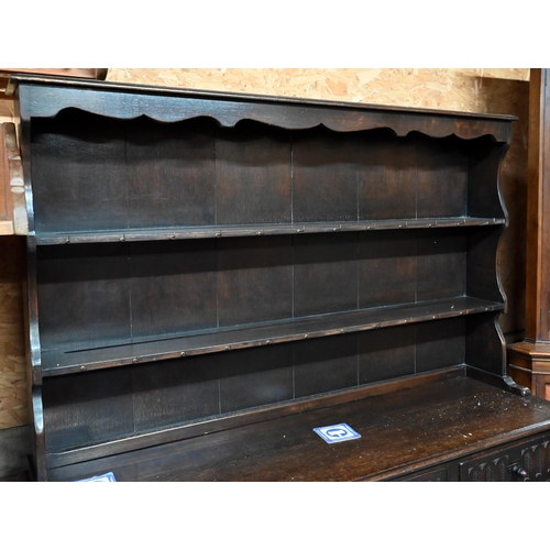 40 - An Old Charm style traditional oak high dresser, the base with three drawers over three cupboards