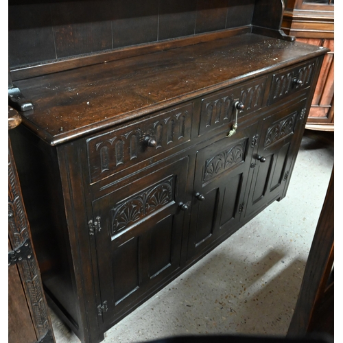 40 - An Old Charm style traditional oak high dresser, the base with three drawers over three cupboards