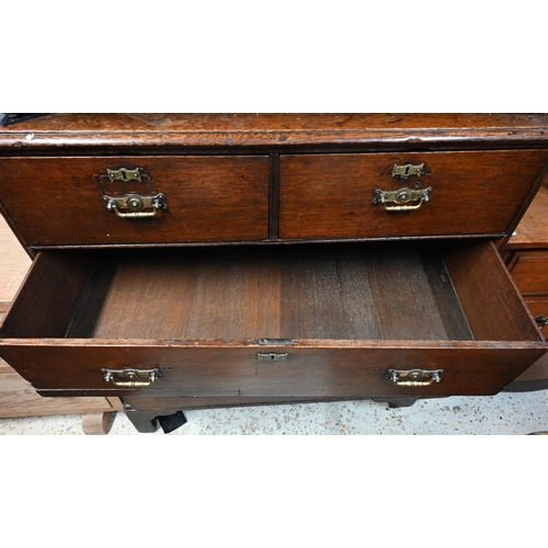 46 - An 18th century and later oak chest of  two short over three long graduated drawers, raised on shape... 