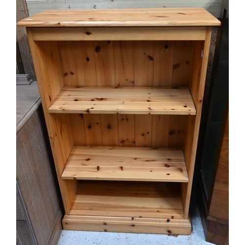 49 - # A small low pine open bookcase with adjustable shelves to/with a vintage oak framed sprung seat nu... 