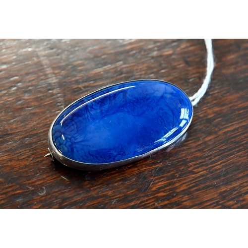 500 - A Ruskin blue-glazed ceramic oval brooch in unmarked white metal mount, stamped 'Ruskin' on back, 2.... 