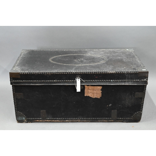 277 - An early19th century Chinese export brass bound and studded leather camphorwood travel trunk, handle... 