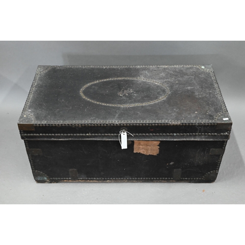 277 - An early19th century Chinese export brass bound and studded leather camphorwood travel trunk, handle... 