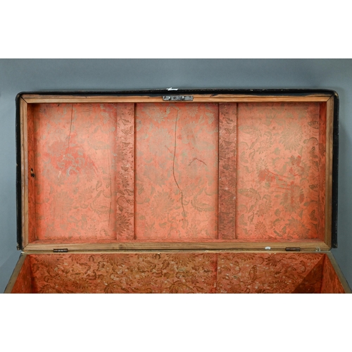 277 - An early19th century Chinese export brass bound and studded leather camphorwood travel trunk, handle... 