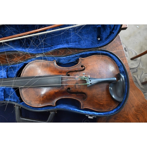 511 - An antique German violin with 35.5cm two-piece back; bears label for 'Sebastian Kloz, Mittenvald, 17... 