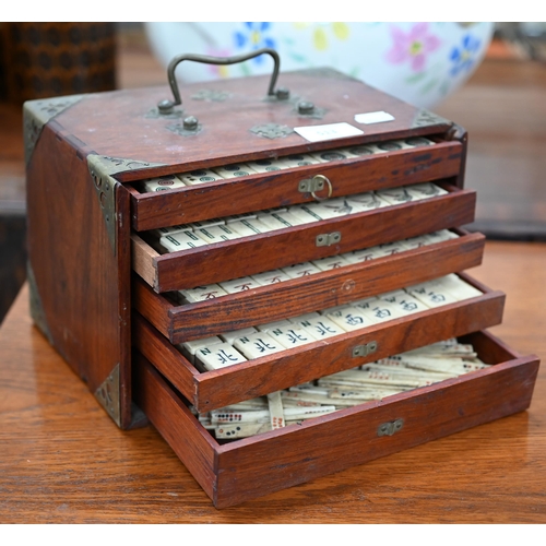 513 - An antique bone and bamboo Mah Jong set, in brass-mounted teak fitted case with five drawers (replac... 