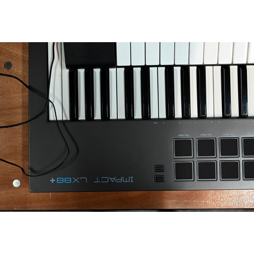 537 - A Native Instruments Komplete Kontrol 588 electric piano (boxed), to/w a Nektar Impact LX88+ keyboar... 