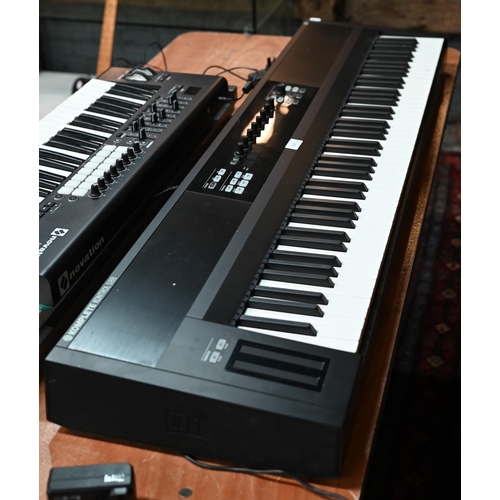 537 - A Native Instruments Komplete Kontrol 588 electric piano (boxed), to/w a Nektar Impact LX88+ keyboar... 