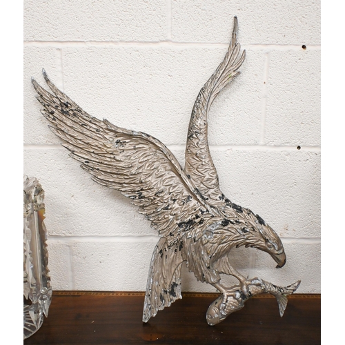 541 - A vintage wooden push-along toy horse, to/w a cast aluminium 'eagle' wall plaque and an African eart... 