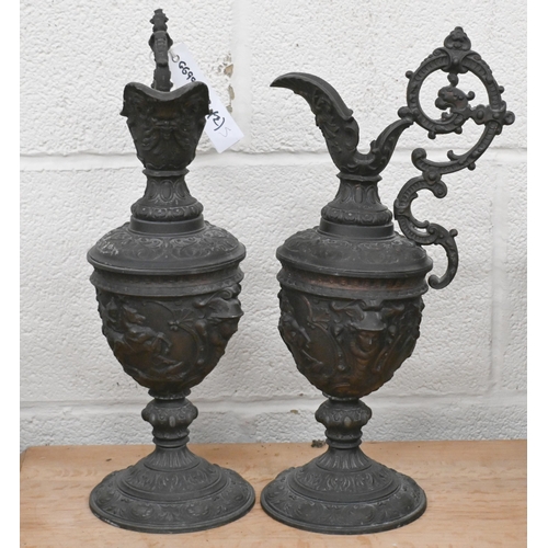 545 - A pair of 19th Century spelter garniture ewers in the Renaissance manner, 38cm high