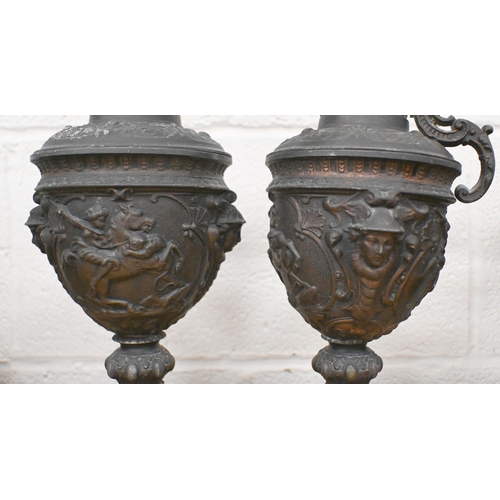 545 - A pair of 19th Century spelter garniture ewers in the Renaissance manner, 38cm high