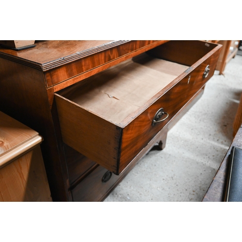 56 - A George III mahogany chest of three long graduated drawers, bone escutcheons, raised on shaped brac... 