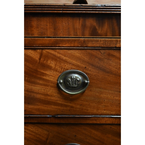 56 - A George III mahogany chest of three long graduated drawers, bone escutcheons, raised on shaped brac... 