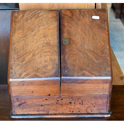 65 - A Victorian mahogany slope front table top stationery box