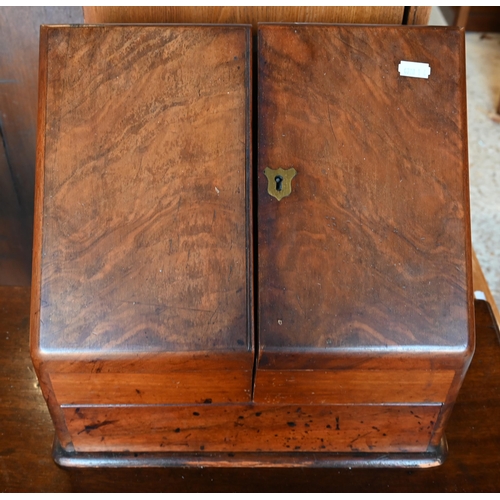 65 - A Victorian mahogany slope front table top stationery box