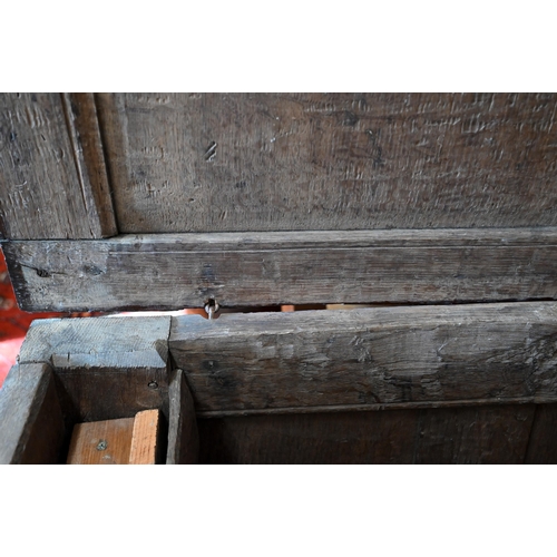 67 - An antique oak linenfold carved coffer, panelled construction with hinged top, 110 cm w x 50 cm d x ... 