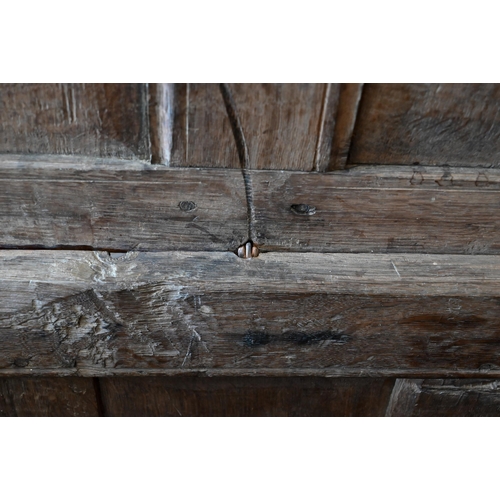 67 - An antique oak linenfold carved coffer, panelled construction with hinged top, 110 cm w x 50 cm d x ... 