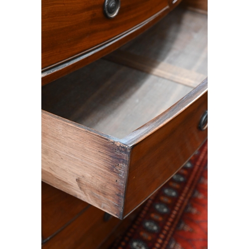 68 - A Victorian mahogany bowfront chest of two short over three long drawers on splayed bracket feet, 11... 