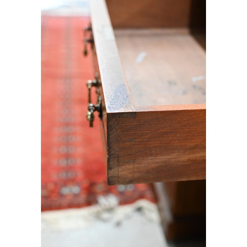 70 - Jas Shoolbred & Co (stamped) - a late Victorian walnut twin pedestal desk with nine drawers, 120... 